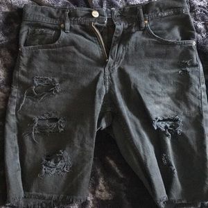 Black Zara ripped jean shorts.